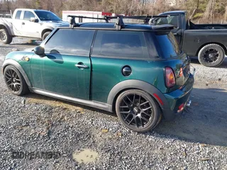 2007 MINI Hardtop S with VIN WMWMF73577TL89211, listed as a IAAI auction lot 41523679 with 136,705 mi miles and . Bid and sale history available at DreamBid. Image 3.