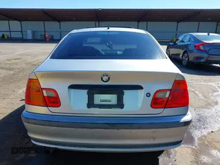 1999 BMW 3 Series 323i with VIN WBAAM3339XCD56164, listed as a IAAI auction lot 41867053 with 233,154 mi miles. Bid and sale history available at carsss.com. Image 17.