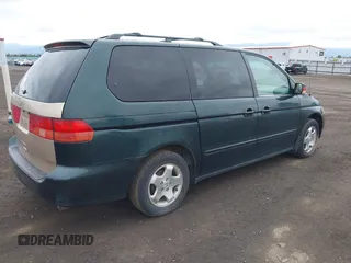 2000 Honda Odyssey EX z VIN 2HKRL1865YH010129, wystawiony jako IAAI lot #42258113 z przebiegiem 191 713 mil mil oraz . Historia ofert i sprzedaży dostępna na DreamBid. Obrazek 4.