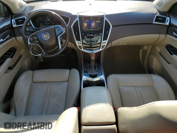 2014 Cadillac SRX Premium Collection z VIN 3GYFNGE34ES687663, wystawiony jako Copart lot #85854534 z przebiegiem 193 653 mil mil oraz Szkody całkowita. Historia ofert i sprzedaży dostępna na DreamBid. Obrazek 8.
