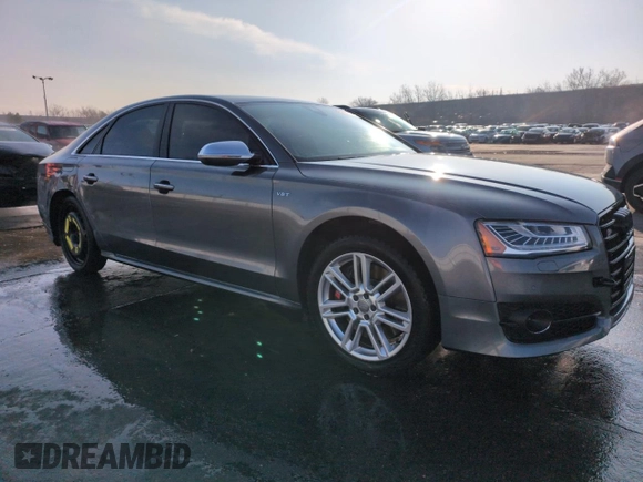 2015 Audi S8 с VIN WAUK2AFDXFN017156, выставлен на аукционе Copart как лот 50602605 с пробегом 100 224 миль миль и Списание • Salvage title. История ставок и продаж доступна на DreamBid. Изображение 4.