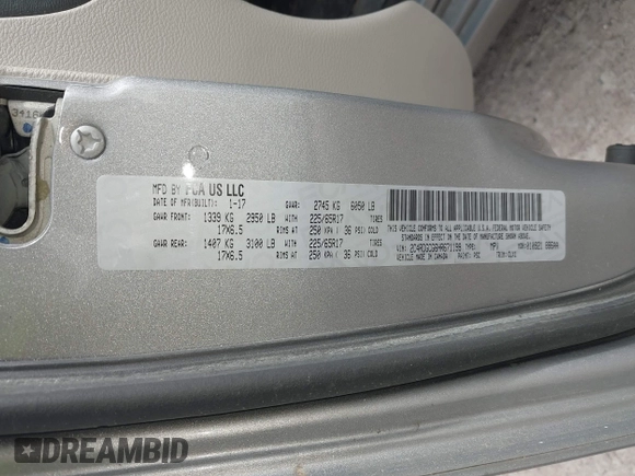 2017 Dodge Grand Caravan SXT with VIN 2C4RDGCG6HR671199, listed as a IAAI auction lot 42031157 with 99,189 mi miles and . Bid and sale history available at DreamBid. Image 9.