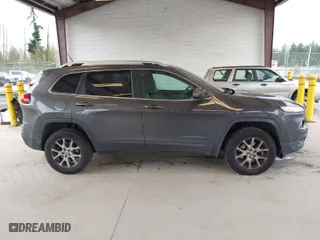 2014 Jeep Cherokee Latitude with VIN 1C4PJMCS4EW142341, listed as a IAAI auction lot 41975942 with 202,992 mi miles. Bid and sale history available at carsss.com. Image 13.
