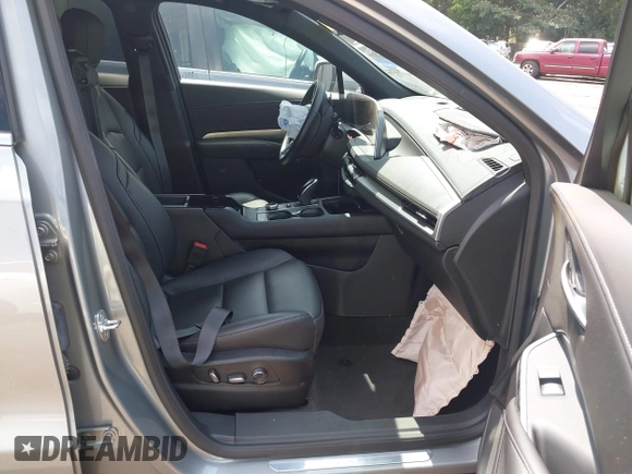 2025 Cadillac XT4 FWD Premium Luxury with VIN 1GYFZCR45SF128039, listed as a IAAI auction lot 42563517 with 18,478 mi miles and . Bid and sale history available at DreamBid. Image 5.