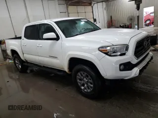 2018 Toyota Tacoma SR5 with VIN 3TMAZ5CN7JM074058, listed as a Copart auction lot 51586455 with 117,877 mi miles and Salvage Title. Bid and sale history available at DreamBid. Image 4.