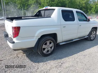 2010 Honda Ridgeline RTL with VIN 5FPYK1F58AB012526, listed as a IAAI auction lot 42421618 with 258,727 mi miles and . Bid and sale history available at DreamBid. Image 4.