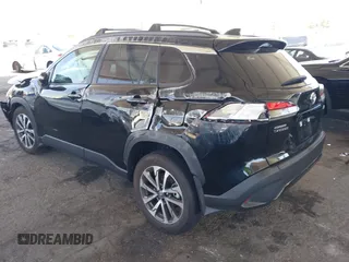 2023 Toyota Corolla Cross XLE with VIN 7MUDAAAG8PV072030, listed as a IAAI auction lot 42397573 with 6,584 mi miles and . Bid and sale history available at DreamBid. Image 3.