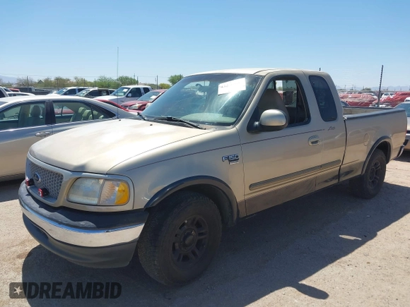 1999 Ford F-150 XL z VIN 1FTRX17L7XNB93799, wystawiony jako IAAI lot #42235164 z przebiegiem 299 846 mil mil oraz . Historia ofert i sprzedaży dostępna na DreamBid. Obrazek 2.