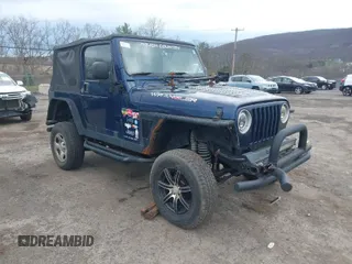 2004 Jeep Wrangler X with VIN 1J4FA39S64P780915, listed as a IAAI auction lot 42035524 with 131,057 mi miles. Bid and sale history available at carsss.com. Image 1.