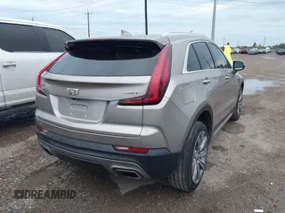 2022 Cadillac XT4 FWD Premium Luxury with VIN 1GYFZCR45NF164754, listed as a IAAI auction lot 41278705 with 65,698 mi miles. Bid and sale history available at carsss.com. Image 4.