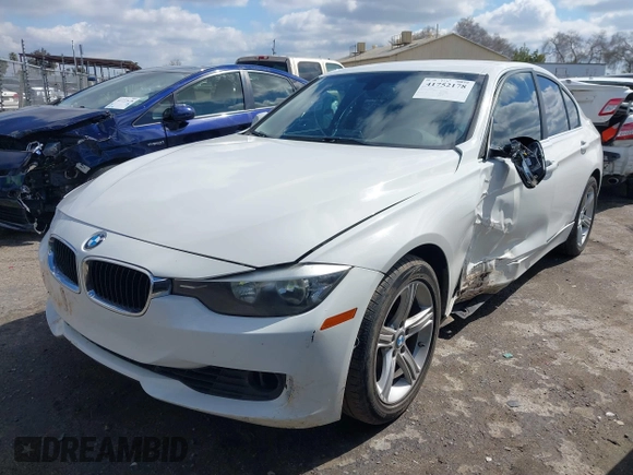 2015 BMW 3 Series 328i with VIN WBA3C1C5XFK117788, listed as a IAAI auction lot 41752178 with 154,030 mi miles and . Bid and sale history available at carsss.com. Image 19.