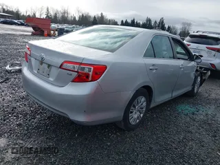 2014 Toyota Camry L with VIN 4T4BF1FK8ER419012, listed as a IAAI auction lot 41819331 with 84,372 mi miles and . Bid and sale history available at DreamBid. Image 4.