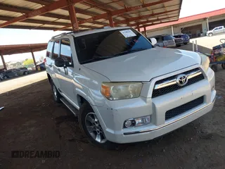 2011 Toyota 4Runner SR5 z VIN JTEZU5JR6B5020860, wystawiony jako IAAI lot #42183683 z przebiegiem 169 218 mil mil oraz . Historia ofert i sprzedaży dostępna na DreamBid. Obrazek 1.