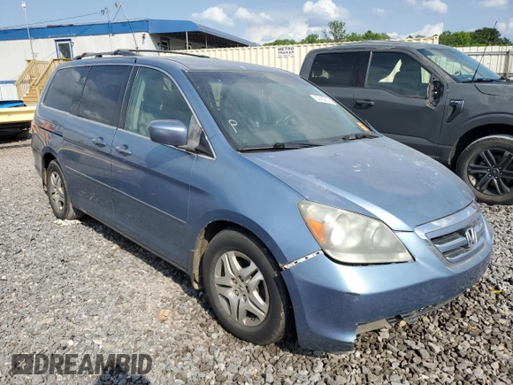 2005 Honda Odyssey EX-L z VIN 5FNRL38685B092279, wystawiony jako Copart lot #57452175 z przebiegiem Nie podano mil oraz Szkoda całkowita • Salvage title. Historia ofert i sprzedaży dostępna na DreamBid. Obrazek 4.