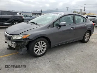 2012 Honda Civic EX with VIN 2HGFB2F86CH330174, listed as a Copart auction lot 56070795 with 137,040 mi miles and Salvage Title. Bid and sale history available at DreamBid. Image 1.