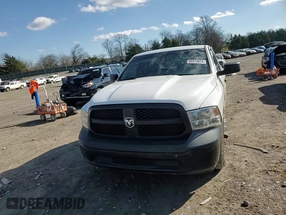 2017 Ram 1500 Express with VIN 1C6RR6FG8HS639089, listed as a Copart auction lot 86879824 with 129,227 mi miles and Salvage title. Bid and sale history available at DreamBid. Image 10.
