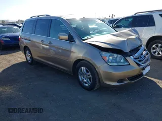 2005 Honda Odyssey EX-L z VIN 5FNRL386X5B018507, wystawiony jako IAAI lot #41535322 z przebiegiem 147 982 mil mil oraz . Historia ofert i sprzedaży dostępna na DreamBid. Obrazek 1.