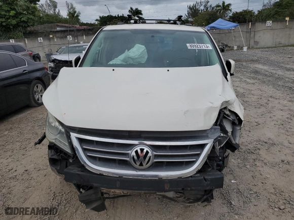 2011 Volkswagen Routan SE with VIN 2V4RW3DG5BR766741, listed as a Copart auction lot 80923713 with 169,703 mi miles and Salvage Title. Bid and sale history available at carsss.com. Image 5.