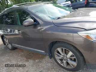 2015 Nissan Pathfinder Platinum with VIN 5N1AR2MM4FC603779, listed as a IAAI auction lot 42731531 with 103,385 mi miles and . Bid and sale history available at DreamBid. Image 13.