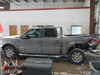 2011 Ford F-150 XLT with VIN 1FTFW1ET4BFB50467, listed as a IAAI auction lot 41608114 with 201,858 mi miles. Bid and sale history available at carsss.com. Image 14.