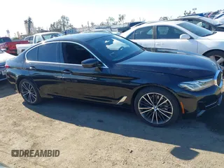2021 BMW 5 Series 530i z VIN WBA53BH05MCF75051, wystawiony jako IAAI lot #41336049 z przebiegiem 71 933 mil mil oraz . Historia ofert i sprzedaży dostępna na DreamBid. Obrazek 13.