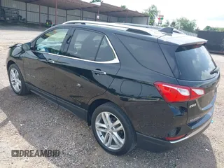2021 Chevrolet Equinox Premier with VIN 2GNAXNEV5M6151910, listed as a IAAI auction lot 42110010 with 45,911 mi miles and . Bid and sale history available at DreamBid. Image 3.