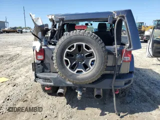 2014 Jeep Wrangler Rubicon with VIN 1C4BJWCG1EL168575, listed as a Copart auction lot 75095814 with 65,770 mi miles and Salvage title. Bid and sale history available at DreamBid. Image 6.