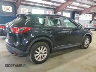 2014 Mazda CX-5 Sport с VIN JM3KE2BE0E0367493, выставлен на аукционе Copart как лот 57324195 с пробегом 103 367 миль миль и Списание • Salvage title. История ставок и продаж доступна на DreamBid. Изображение 3.