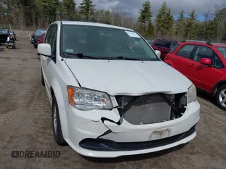2012 Dodge Grand Caravan SXT with VIN 2C4RDGCGXCR248859, listed as a IAAI auction lot 41829411 with 111,515 mi miles and . Bid and sale history available at DreamBid. Image 12.