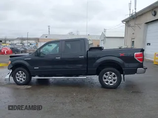 2013 Ford F-150 XL with VIN 1FTFW1ETXDFD72322, listed as a IAAI auction lot 41957807 with 312,909 mi miles. Bid and sale history available at carsss.com. Image 14.