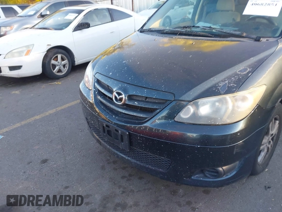 2005 Mazda MPV LX with VIN JM3LW28A650547549, listed as a IAAI auction lot 40682851 with 212,438 mi miles. Bid and sale history available at carsss.com. Image 6.