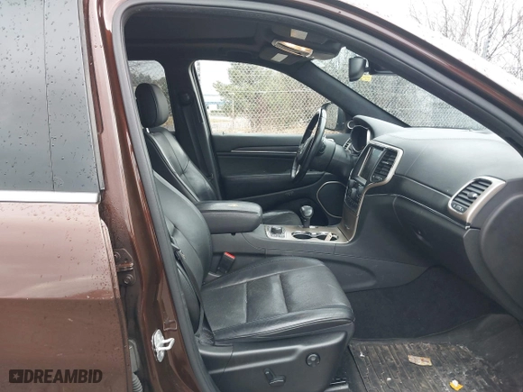 2014 Jeep Grand Cherokee Summit with VIN 1C4RJFJGXEC572752, listed as a IAAI auction lot 41905142 with 205,858 mi miles. Bid and sale history available at carsss.com. Image 5.