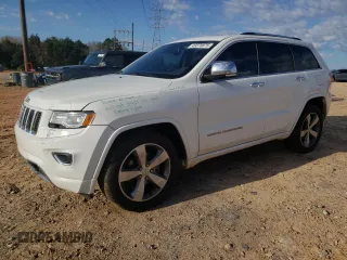 2015 Jeep Grand Cherokee High Altitude with VIN 1C4RJECG4FC654789, listed as a Copart auction lot 49378875 with 163,192 mi miles and Salvage Title. Bid and sale history available at carsss.com. Image 1.