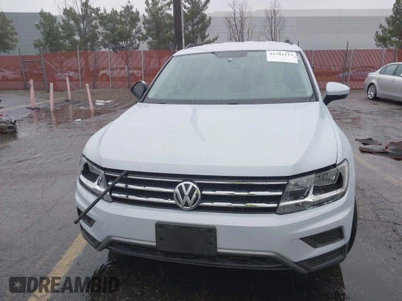 2018 Volkswagen Tiguan S z VIN 3VV1B7AX4JM121567, wystawiony jako IAAI lot #41581113 z przebiegiem Nie podano mil oraz . Historia ofert i sprzedaży dostępna na DreamBid. Obrazek 12.