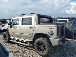 2005 Hummer H2 SUT with VIN 5GRGN22U85H110412, listed as a Copart auction lot 73856704 with 262,954 mi miles and Salvage Title. Bid and sale history available at carsss.com. Image 2.