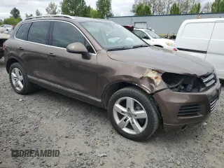 2012 Volkswagen Touareg Lux с VIN WVGEK9BPXCD012003, выставлен на аукционе Copart как лот 54910865 с пробегом 106 465 миль миль и Списание • Salvage title. История ставок и продаж доступна на DreamBid. Изображение 4.