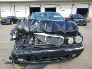 2007 Jaguar XJ Vanden Plas z VIN SAJWA82B67SH13461, wystawiony jako Copart lot #49654865 z przebiegiem 151 298 mil mil oraz Szkody całkowita. Historia ofert i sprzedaży dostępna na DreamBid. Obrazek 5.