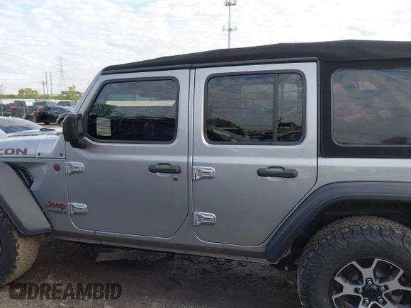 2021 Jeep Wrangler Unlimited Rubicon with VIN 1C4HJXFNXMW560512, listed as a IAAI auction lot 42124812 with 18,034 mi miles and . Bid and sale history available at DreamBid. Image 15.