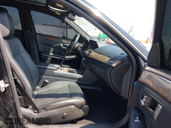 2014 Mercedes-Benz E 550 Sport with VIN WDDHF9BB3EA853780, listed as a IAAI auction lot 42098579 with 156,713 mi miles and . Bid and sale history available at DreamBid. Image 5.
