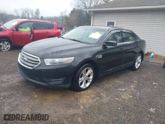 2013 Ford Taurus SEL with VIN 1FAHP2E83DG107913, listed as a IAAI auction lot 42007575 with 147,240 mi miles. Bid and sale history available at carsss.com. Image 2.