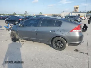 2010 Honda Insight EX with VIN JHMZE2H72AS025427, listed as a Copart auction lot 54983775 with 184,052 mi miles and Salvage Title. Bid and sale history available at DreamBid. Image 2.
