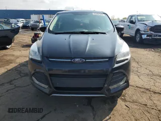 2014 Ford Escape SE with VIN 1FMCU0GX6EUA37327, listed as a Copart auction lot 55298925 with 129,497 mi miles and Clean Title. Bid and sale history available at carsss.com. Image 5.