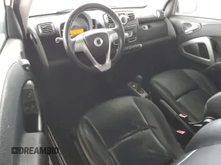 2008 Smart fortwo Pure z VIN WMEEJ31X98K106240, wystawiony jako Copart lot #46756535 z przebiegiem 113 587 mil mil oraz Szkody całkowita. Historia ofert i sprzedaży dostępna na DreamBid. Obrazek 8.