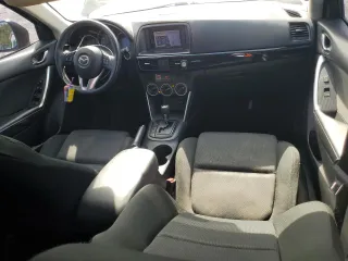2014 Mazda CX-5 Sport with VIN JM3KE2BE3E0361736, listed as a Copart auction lot 64306405 with 114,468 mi miles and Clean title. Bid and sale history available at DreamBid. Image 8.