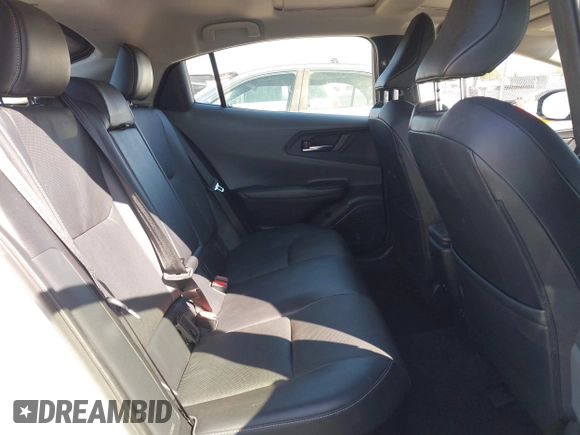 2023 Toyota Prius LE with VIN JTDACAAUXP3012538, listed as a IAAI auction lot 41948103 with 33,338 mi miles and . Bid and sale history available at DreamBid. Image 8.
