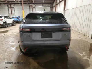 2020 Land Rover Range Rover Velar S z VIN SALYB2EX7LA290601, wystawiony jako Copart lot #47217515 z przebiegiem 43 737 mil mil oraz Szkody całkowita. Historia ofert i sprzedaży dostępna na DreamBid. Obrazek 6.