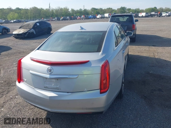 2013 Cadillac XTS with VIN 2G61N5S31D9135710, listed as a IAAI auction lot 42002480 with 162,029 mi miles. Bid and sale history available at carsss.com. Image 16.