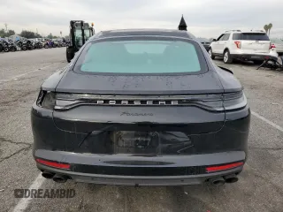 2022 Porsche Panamera z VIN WP0AJ2A79NL102055, wystawiony jako Copart lot #82739553 z przebiegiem 12 943 mil mil oraz . Historia ofert i sprzedaży dostępna na DreamBid. Obrazek 6.