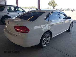 2014 Volkswagen Passat SE с VIN 1VWBN7A3XEC087730, выставлен на аукционе IAAI как лот 42374482 с пробегом 199 449 миль миль и . История ставок и продаж доступна на DreamBid. Изображение 4.