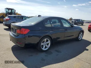 2014 BMW 3 Series 328i xDrive with VIN WBA3B3C58EJ977546, listed as a Copart auction lot 53090185 with 134,823 mi miles and Salvage Title. Bid and sale history available at DreamBid. Image 3.